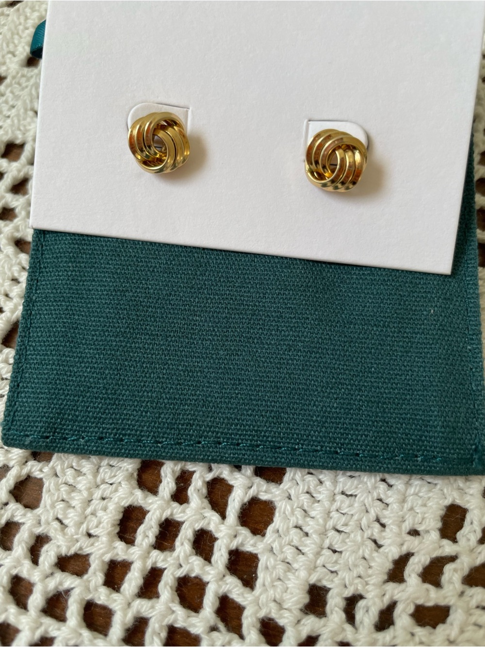 Gold-tone love knot open basket-style stud earrings (unmarked)